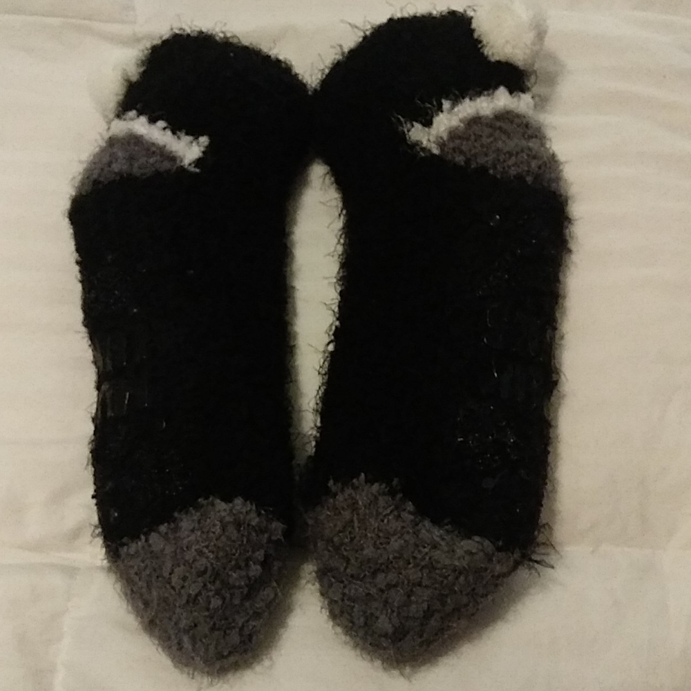 Black and white Muk luk cabin slippers